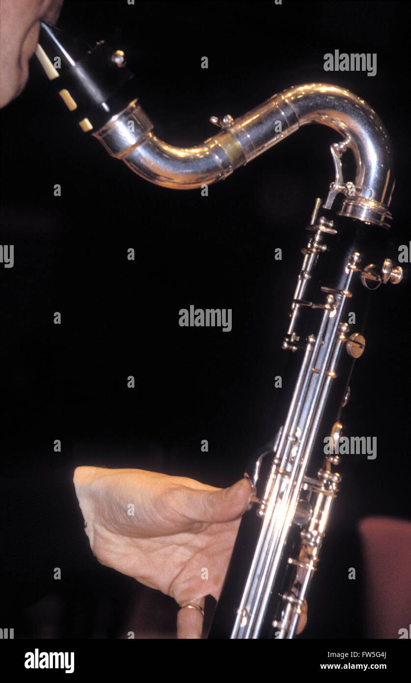 Bass close up of the neck and upper half being played with a