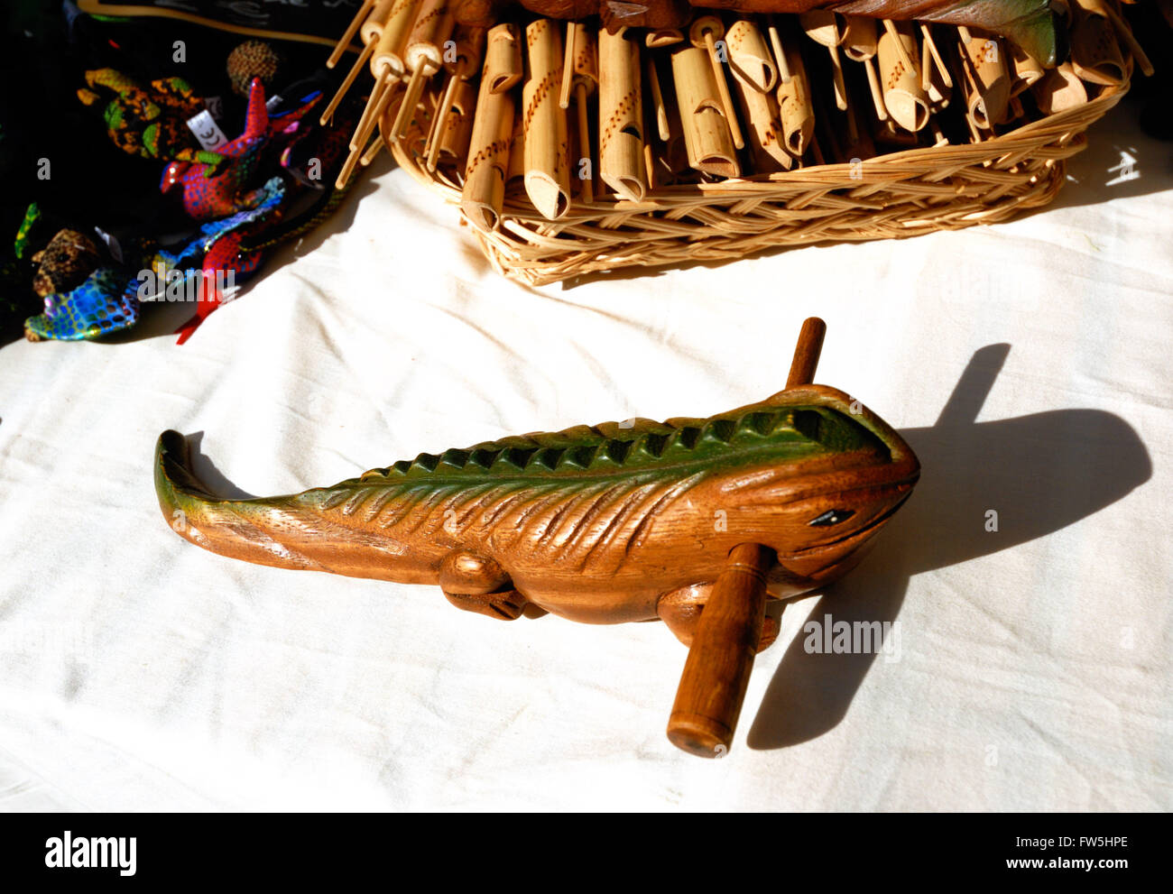 lizard or fish guiro, rattle, percussion from Vietnam; rub stick along ridges of back Stock Photo