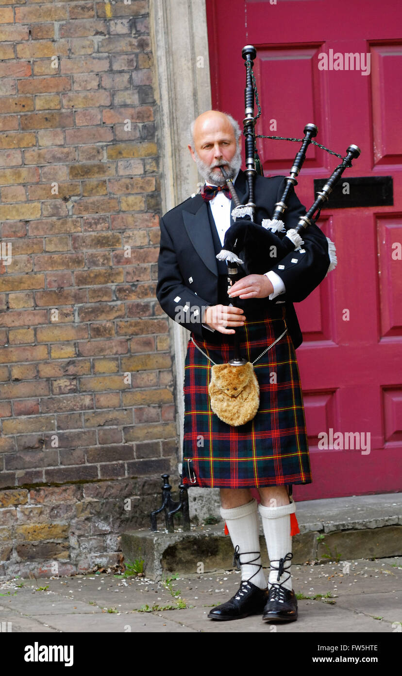 Bagpiper playing bagpipes hires stock photography and images Alamy