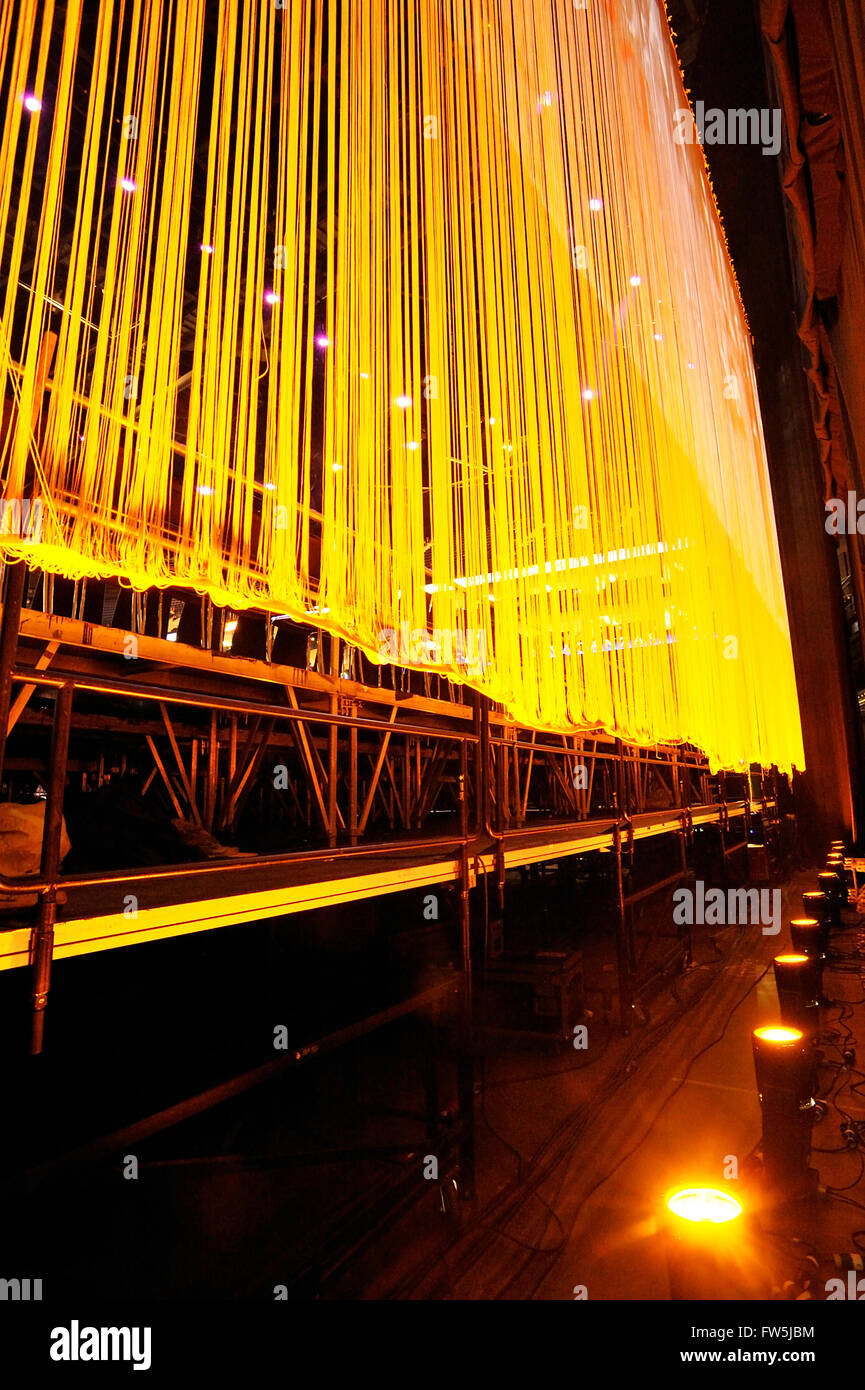 hanging backdrop curtain with spotlights, behind the stage in the auditorium of the O2 Arena, Millennium Dome (Millenium), North Greenwich, London, Stock Photo