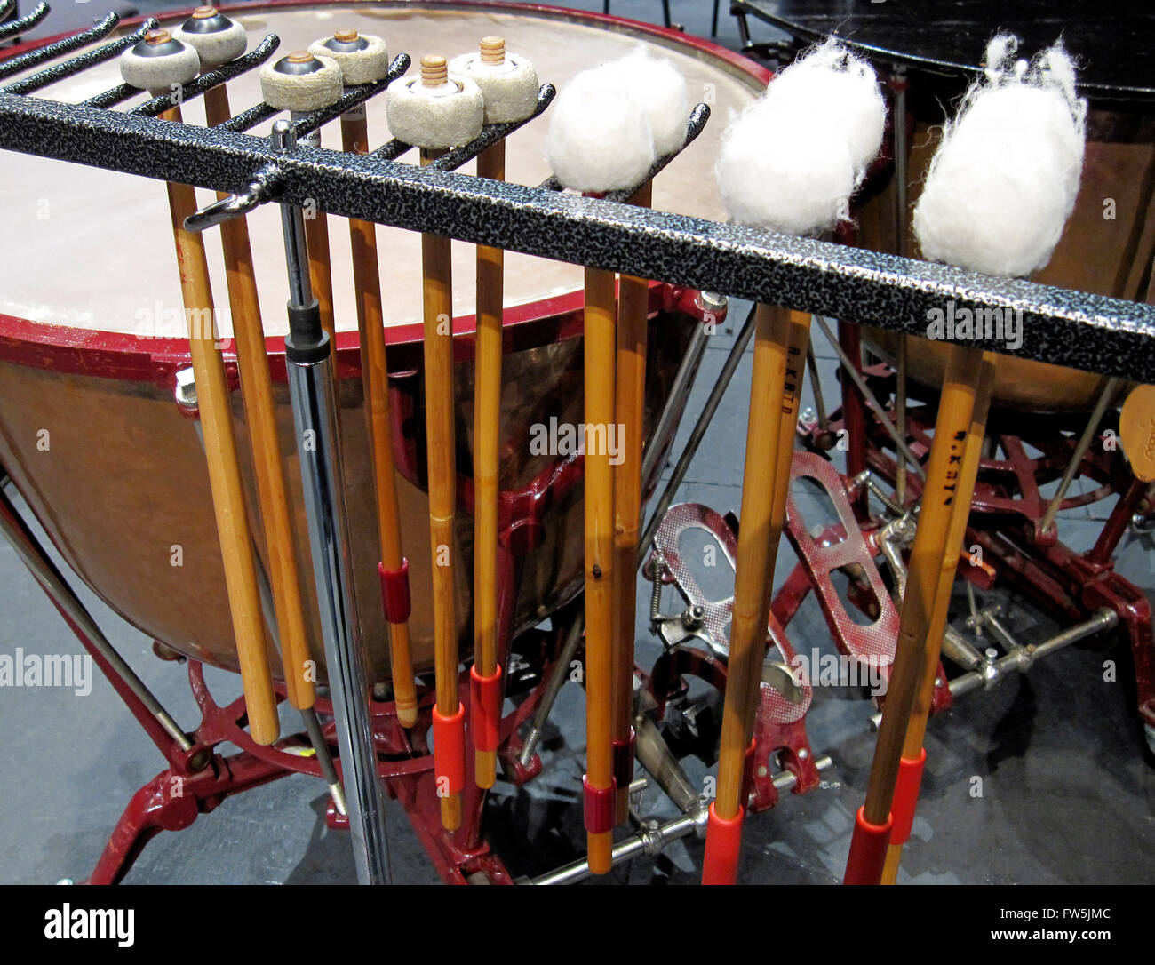 range of timpani (kettle drum) sticks, ranging from L to R: hard to very soft; and showing foot pedal for tuning, tuning pedal Stock Photo