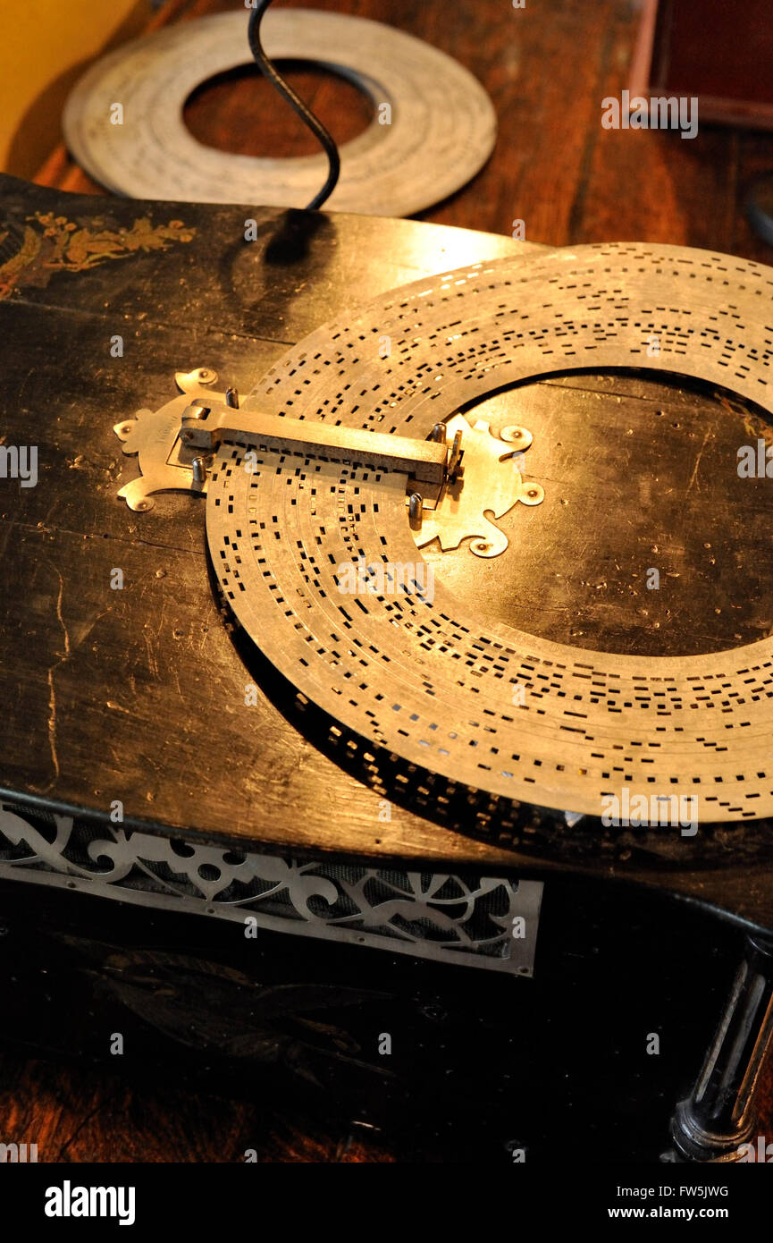 Phoenix musical box with large, numbered perforated disc: 'Opera reel' with pins. 'courtesy of The Collector Restorations & Co., Barnard Castle, Co. Durham' Stock Photo