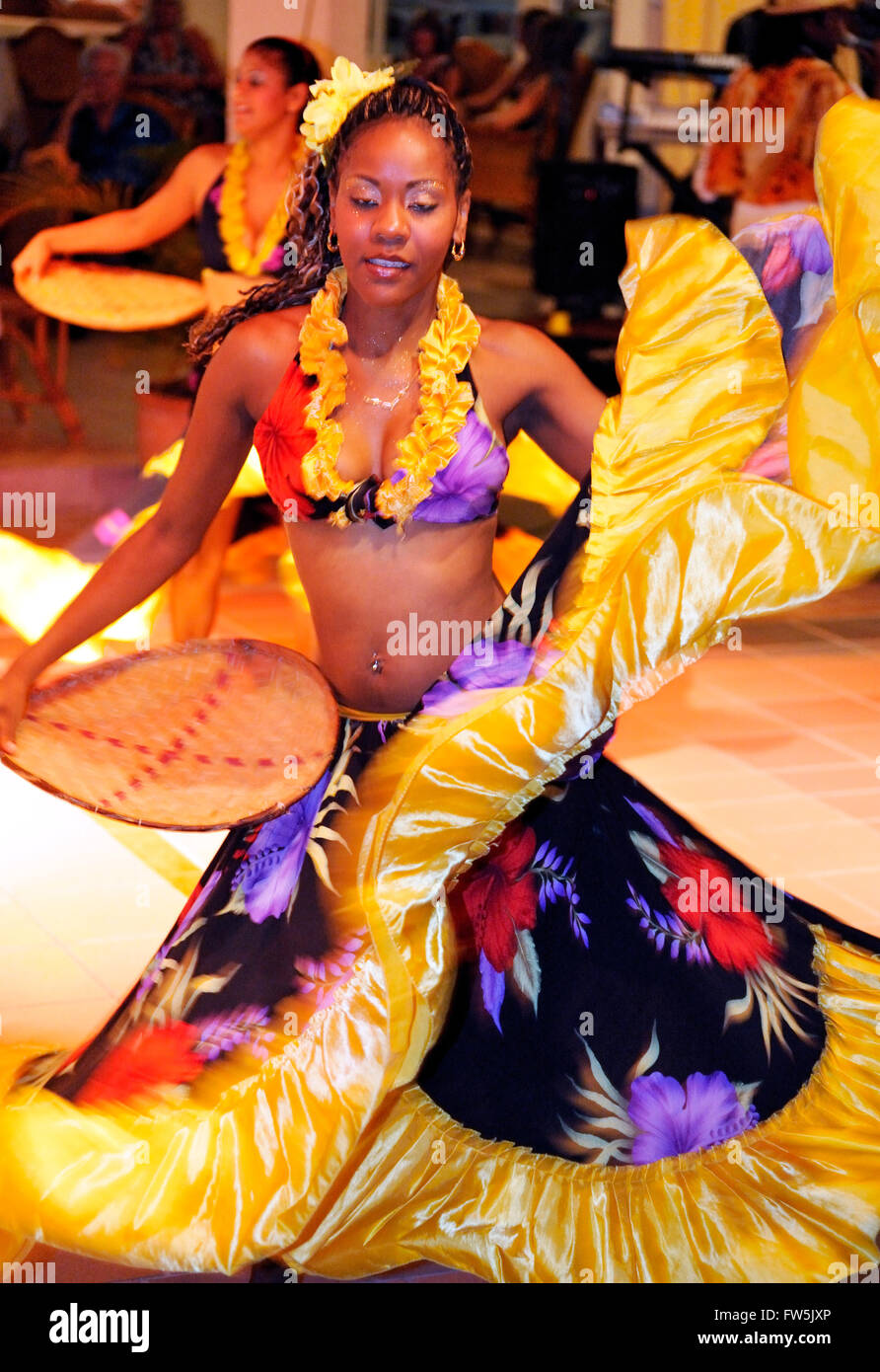 female Sega dancer in hotel, Mauritius, Indian Ocean, entertaining tourists. Sega is the national song and dance of Mauritius, Stock Photo