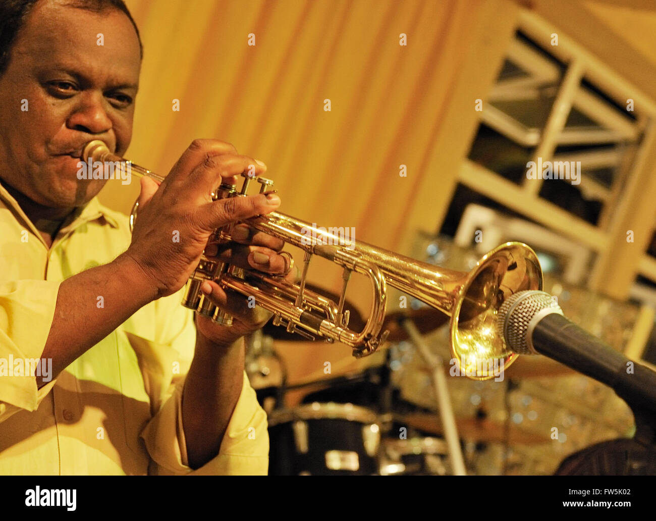 black trumpeter in hotel night club, Mauritius, playing Sega music and jazz Stock Photo