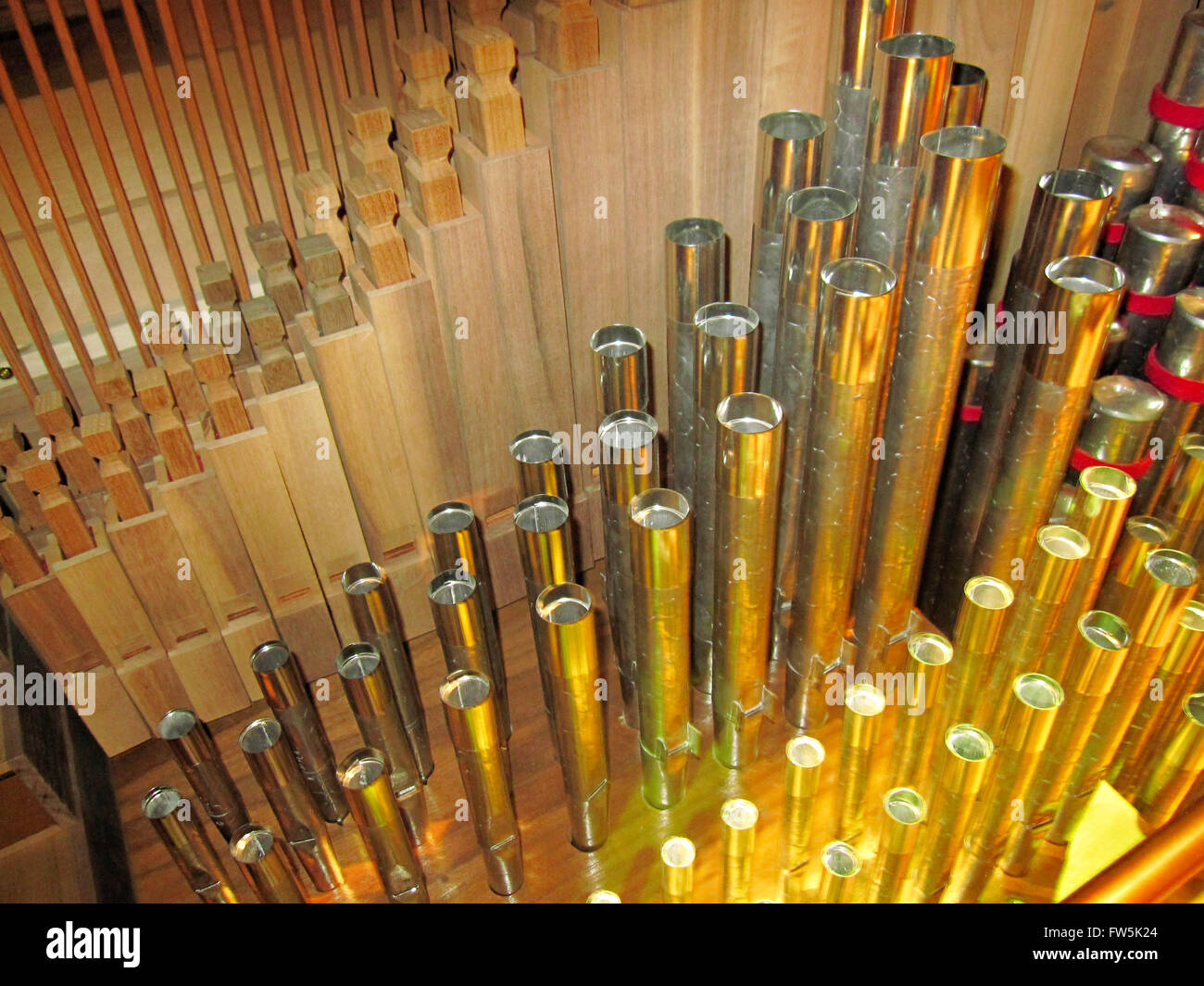 wooden and metal organ pipes inside a chamber organ by Peter Collins ...