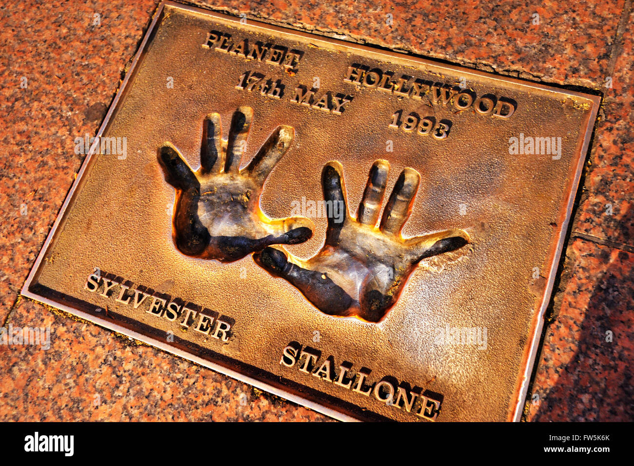 Sylvester Stallone bronze plaque of handprint set into the pavement of Leicester Square: of Sylvester Stallone: 'Planet Stock Photo