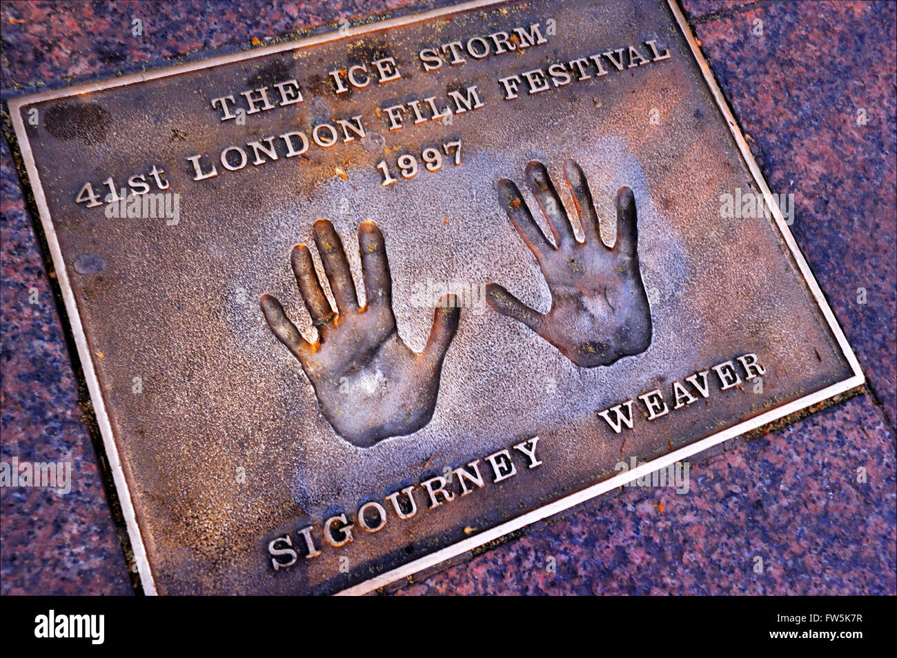 Sigourney Weaver bronze plaque of handprint set into the pavement of Leicester Square: of Sigourney Weaver: 'The Ice Storm', Stock Photo