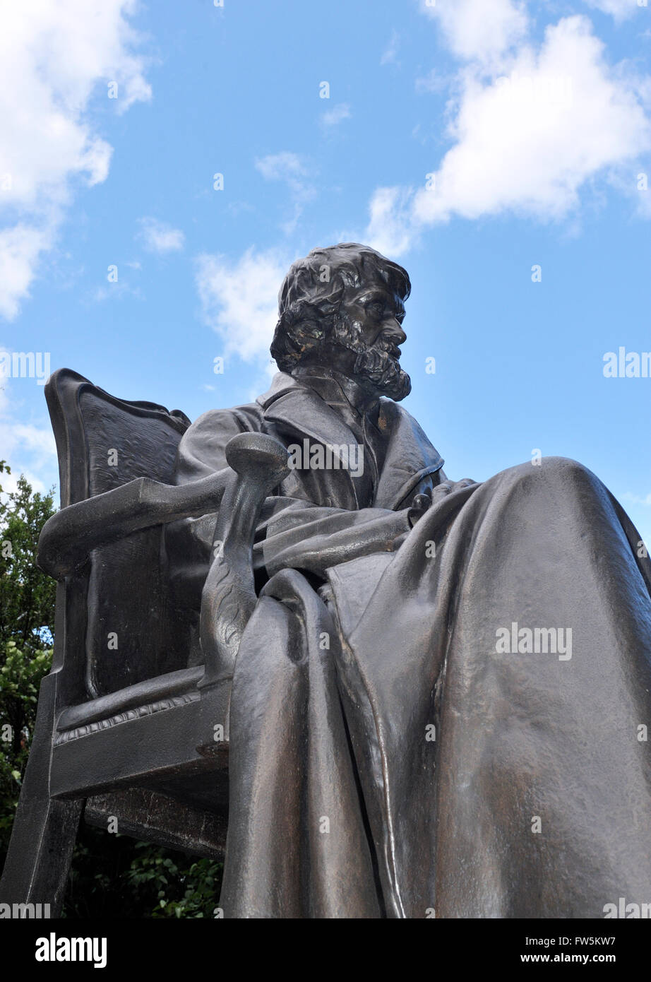Thomas Carlyle statue seated  in Cheyne Walk, Chelsea, London . Scottish writer, critic, essayist, historian, 1795-1881, Stock Photo