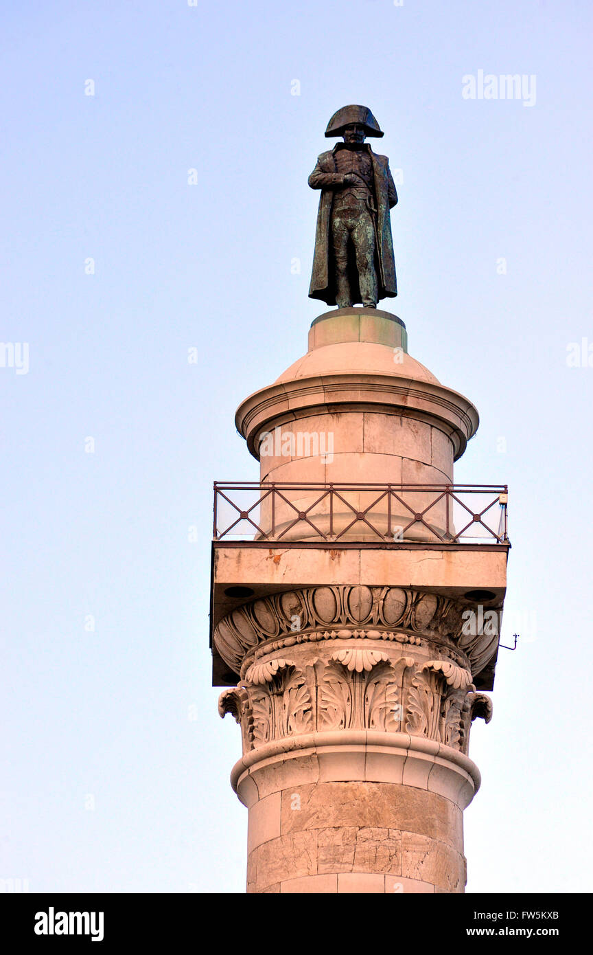 Statue of Emperor Napoleon Bonaparte on the heights of Boulogne-sur-Mer (département du Pas-de-Calais, France). Erected in a renewal of French national pride in the 1840s, the 53 metre-high column marks the base camp where Napoleon massed France's biggest ever army, 80,000 men, ready to invade England, 1802-5. After the Second World War, the French government turned the statue of Napoleon round to face inland, as a mark of respect to her British allies in the war. The gold French Imperial eagle adorns the railings. Author Charles Dickens frequently stayed at the low end of the long path leadin Stock Photo