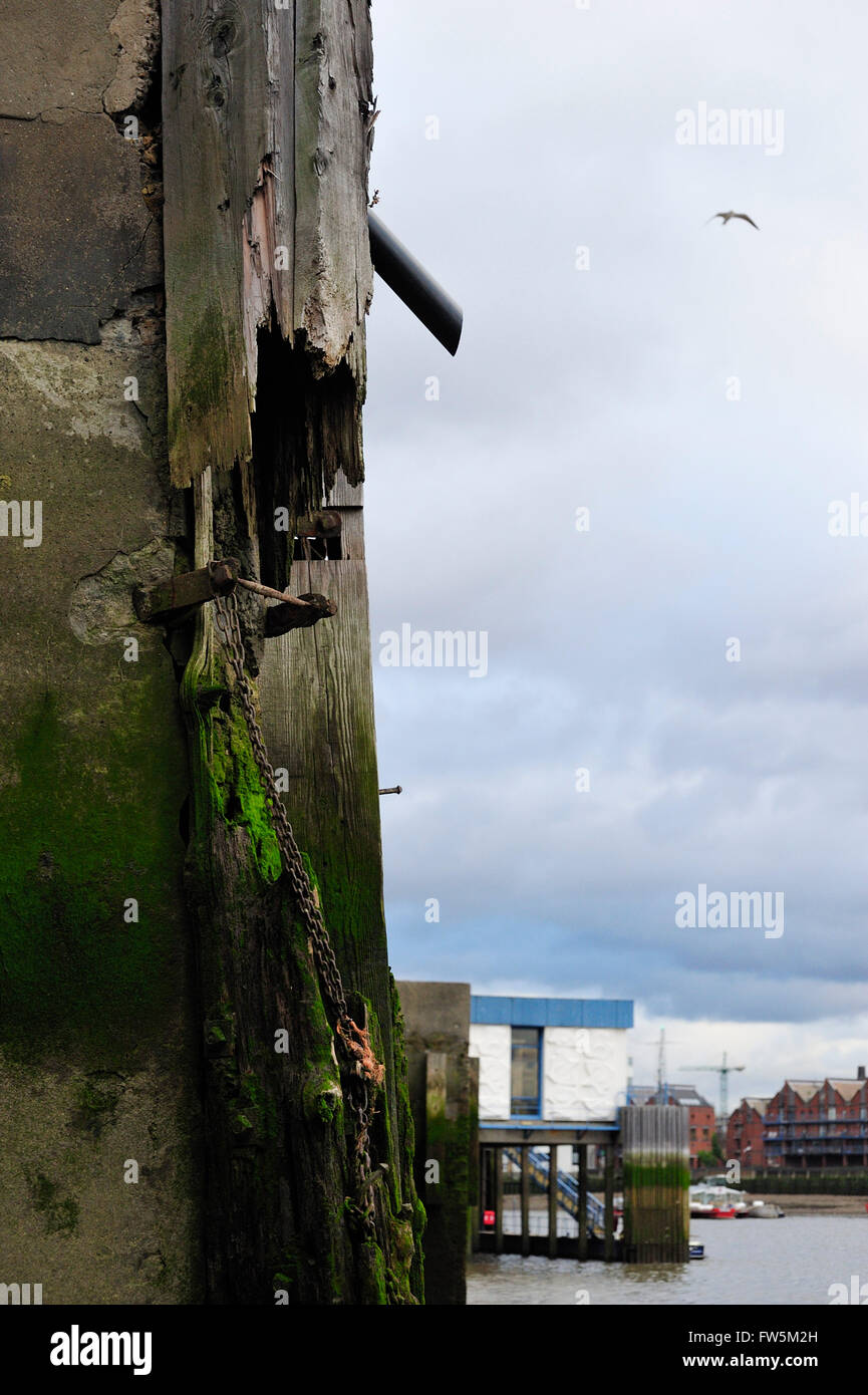 River Thames and remains of Victorian wharf bulwark, at Wapping Old