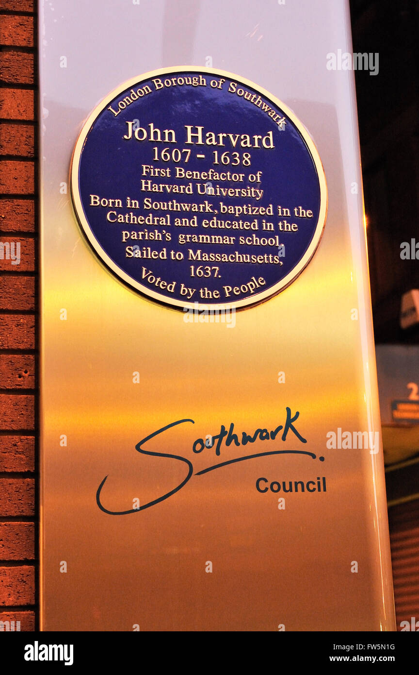plaque to John Harvard (1607-1638), the first benefactor of Harvard University, USA. Born in Southwark London, baptised in the cathedral, educated in the parish grammar school. Plaque on Borough High St, Southwark, London, by St George's church. Stock Photo