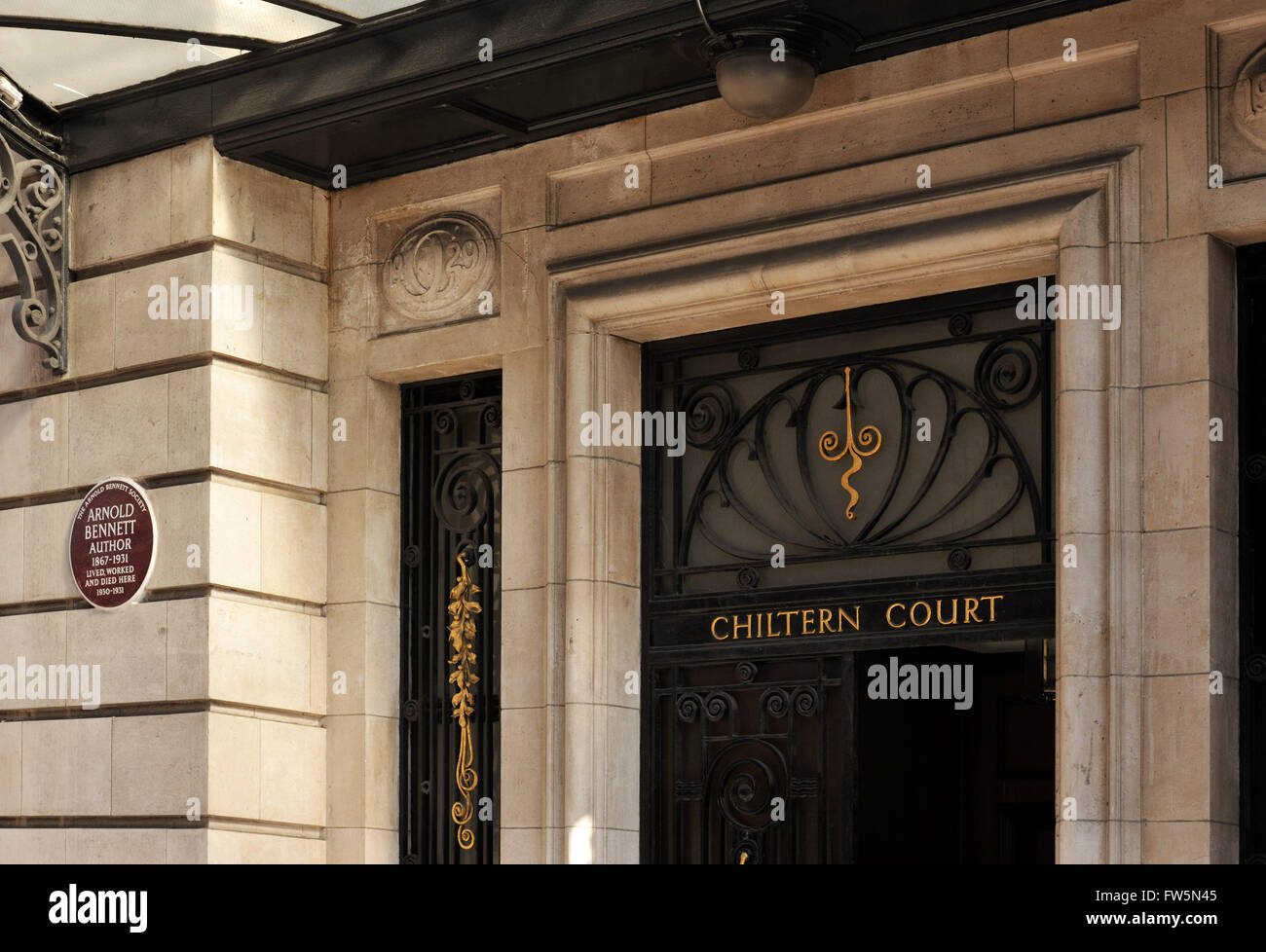 plaque at Chiltern Court, Baker Street station, London the home of