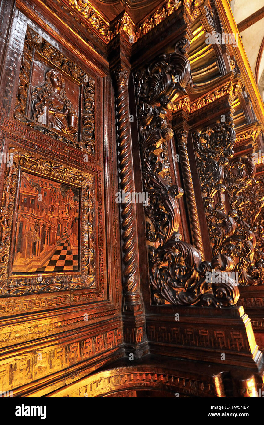 Choir stalls, Frari church, detail; on the Campo dei Frari, San Polo district, Venice. The Basilica di Santa Maria Gloriosa dei Frari. The inlaid ('intarsia') stalls of the choir were the work of the Cozzi family of Vicenza in the mid 1400s.'The building was completed in the century following 1338. Stock Photo