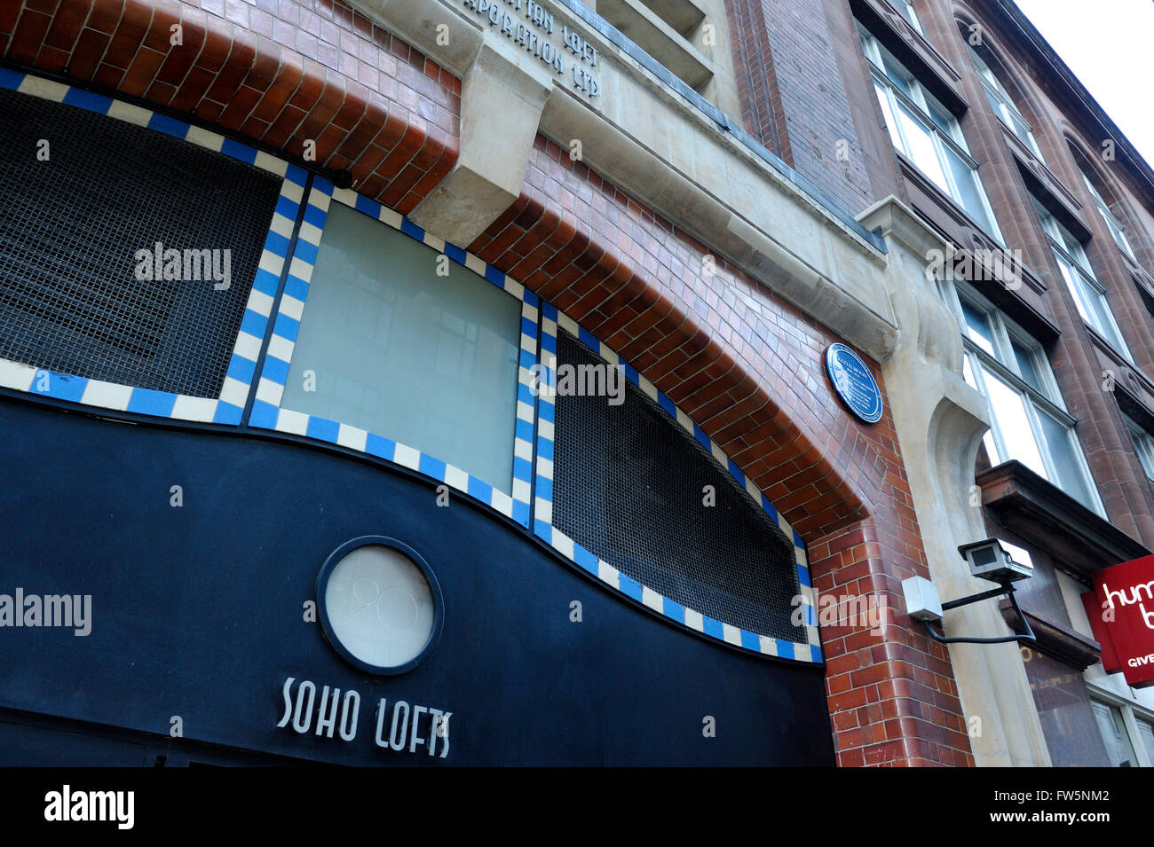 Marquee Club entrance, now to Soho Lofts, 90 Wardour St., Soho, W.1.owned and created by Harold Pendleton, friend and manager of jazz trombonist Chris Barber. The Marquee was witness to the London psychedelic scene of the late 60's, with bands including Pink Floyd. Site of the debut of supergroup Cream in 1966. Jimi Hendrix only played three times at the club (1967)- considered some of his best live performances ever. The second night at the club beat all the records of attendance and it is marked as one of the most important nights in the history of rock music. Stock Photo