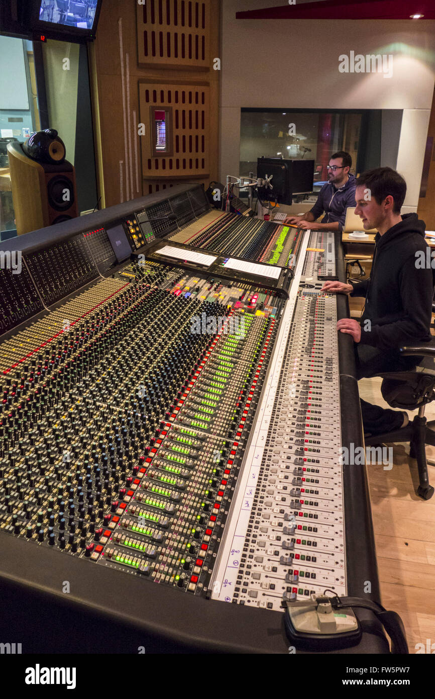Sound mixing desk, Abbey Road Studios, London NW8, Studio 1. With sound engineer at controls. Studio One is the worldÕs largest Stock Photo