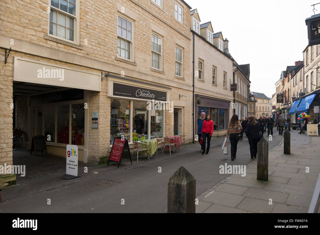 People walking along and shopping in Black Jack Street, Cirencester