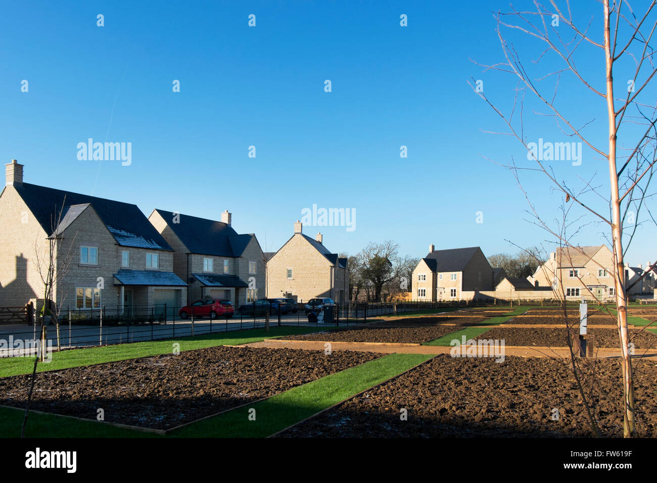 Allotments on a new housing development on the outskirts of Cotswold market town Fairford in Gloucestershire, England, UK Stock Photo