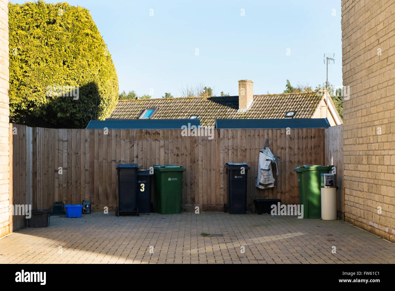 Recycling and rubbish bins on a new housing development on the