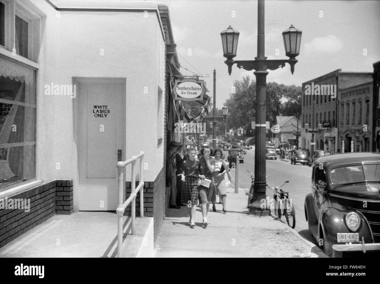 'White Ladies Only' restroom on a street in Durham, North Carolina, USA. Photo by Jack Delano, 1940. Stock Photo