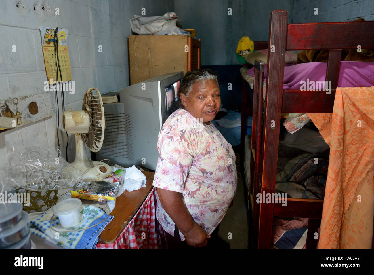 Old woman in her hut, slum Favela 21 de Abril, São Paulo, Brazil Stock Photo