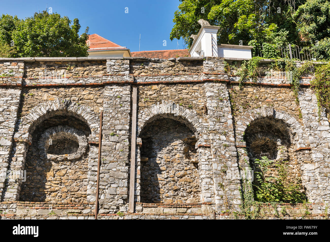 Ancient fortified stone wall close to Volkskunde museum in Graz, Austria Stock Photo