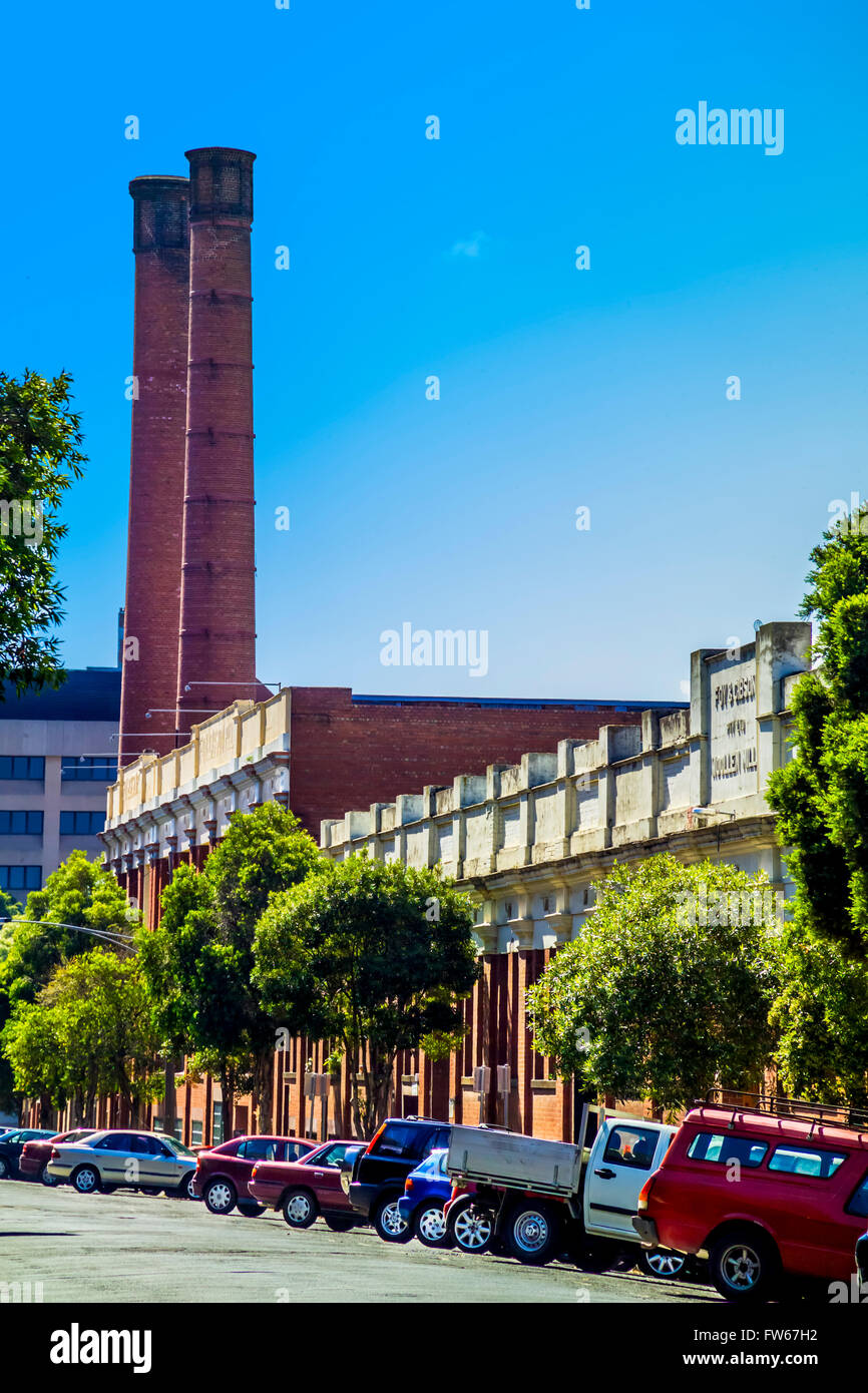 Red Brick tall chimneys of heritage building Foy & Gibson Woollen Mills, established in 1883, Collingwood, Melbourne, Victoria, Australia Stock Photo