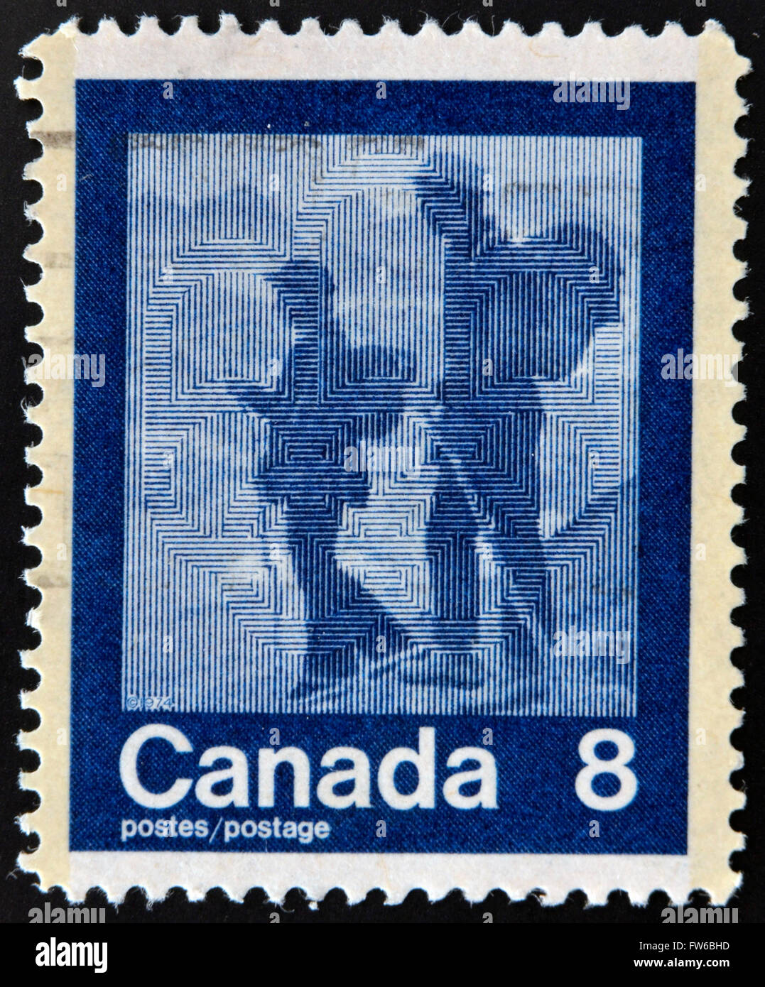 CANADA - CIRCA 1974: stamp printed in Canada shows mountaineering, circa 1974 Stock Photo