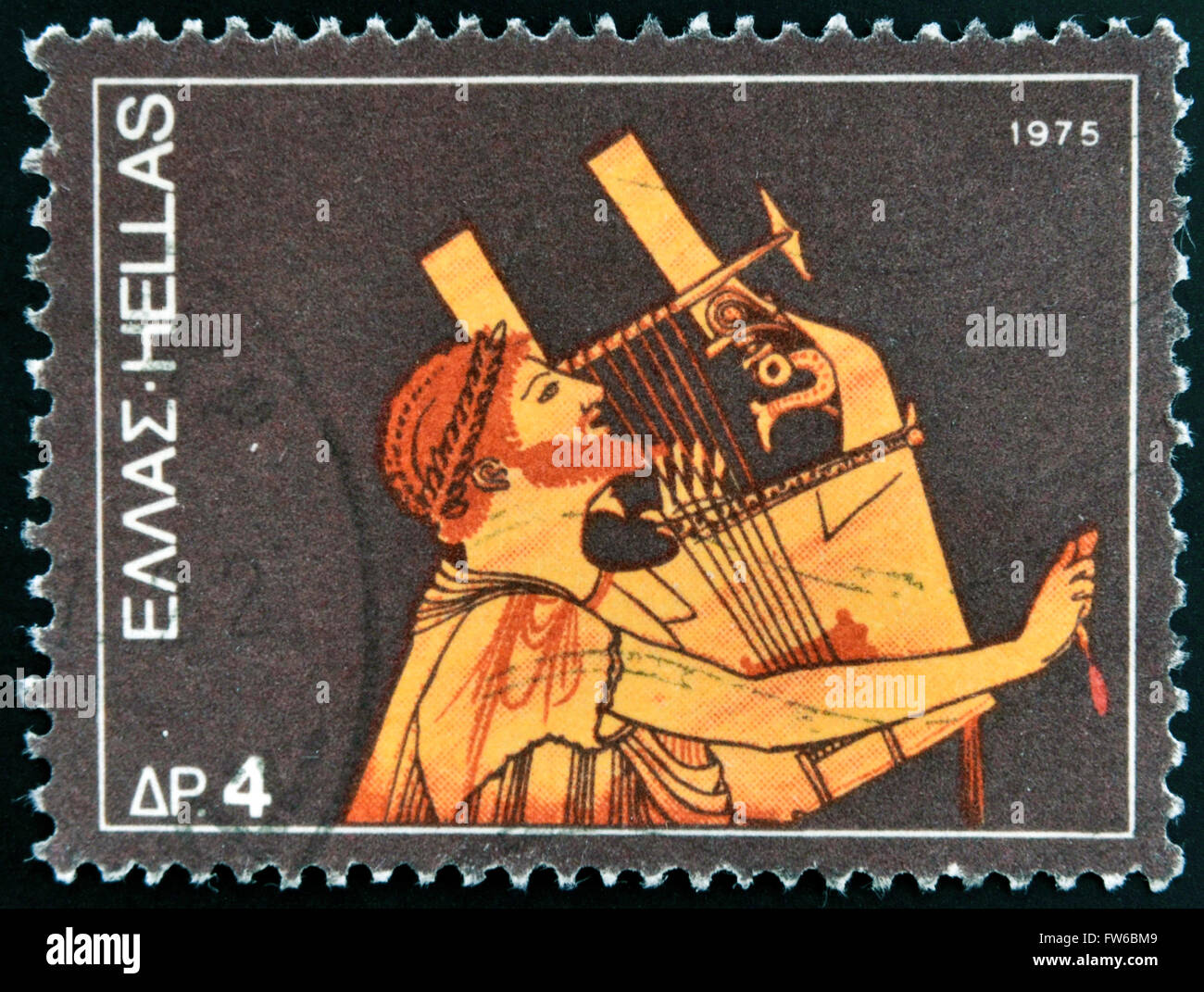 GREECE - CIRCA 1975: A stamp printed in Greece dedicated to the traditional musical instruments shows an ancient guitar player, Stock Photo