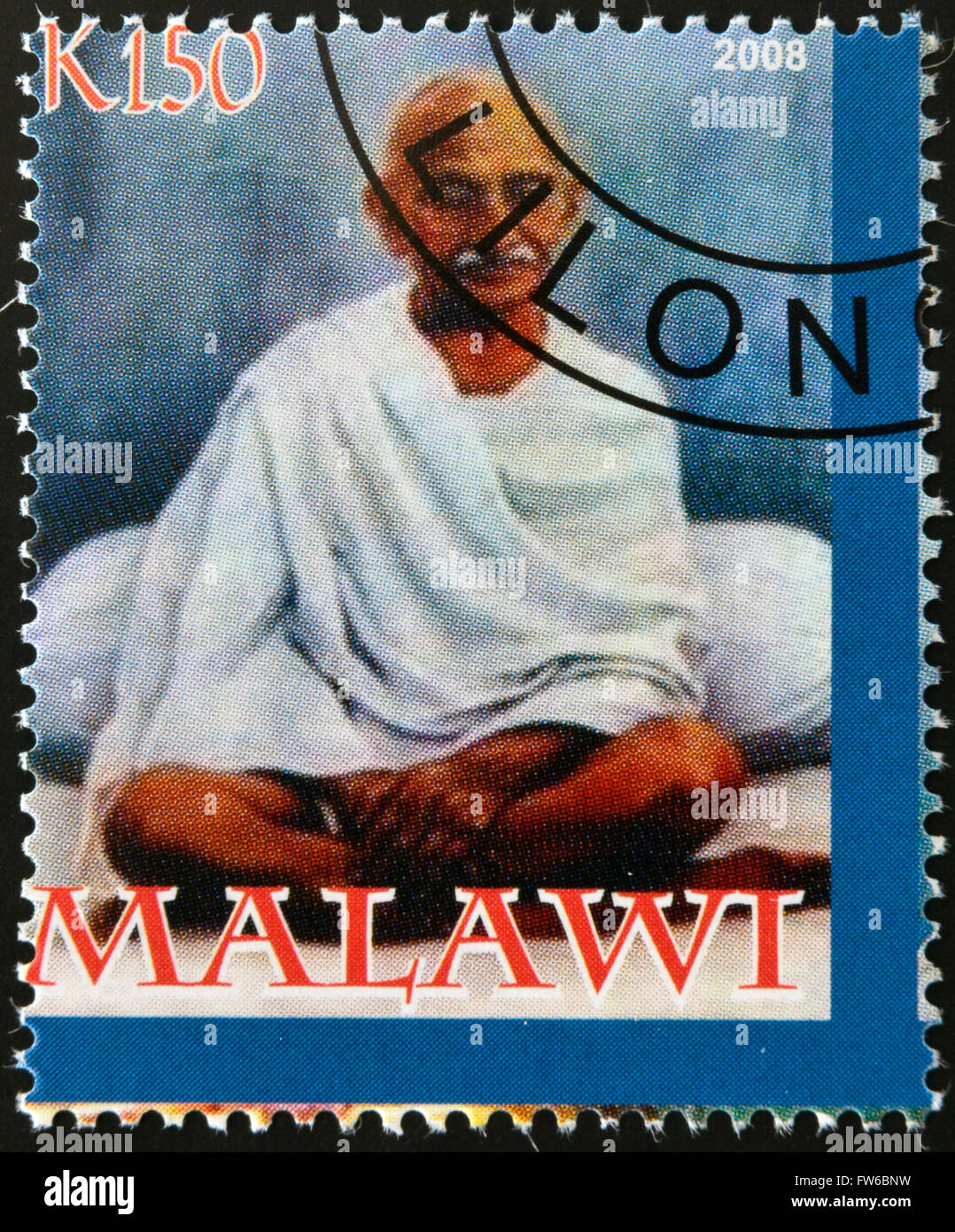 MALAWI - CIRCA 2004: A stamp printed in Malawi shows Mohandas Karamchand Gandhi, circa 2004 Stock Photo