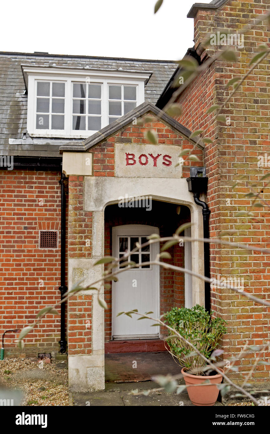 Boys' entrance to a school Stock Photo