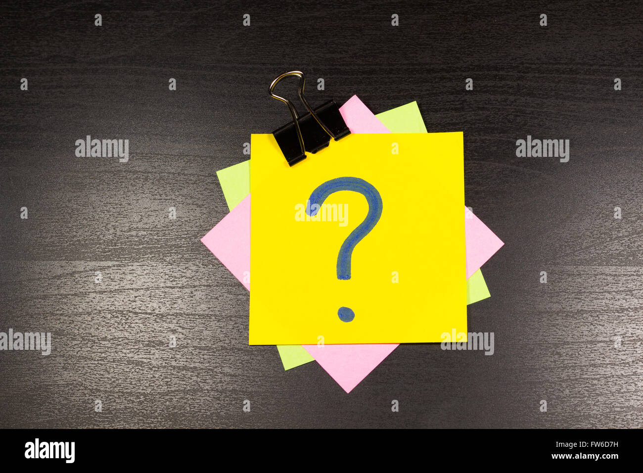 Question Mark On A Sticky Note On Wooden Background Stock Photo - Alamy