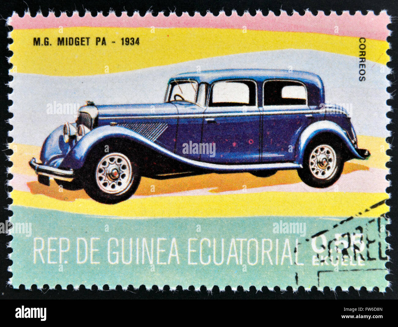 EQUATORIAL GUINEA - CIRCA 1974: A stamp printed in Guinea dedicated to vintage cars, shows MG Midget, 1934, circa 1974 Stock Photo
