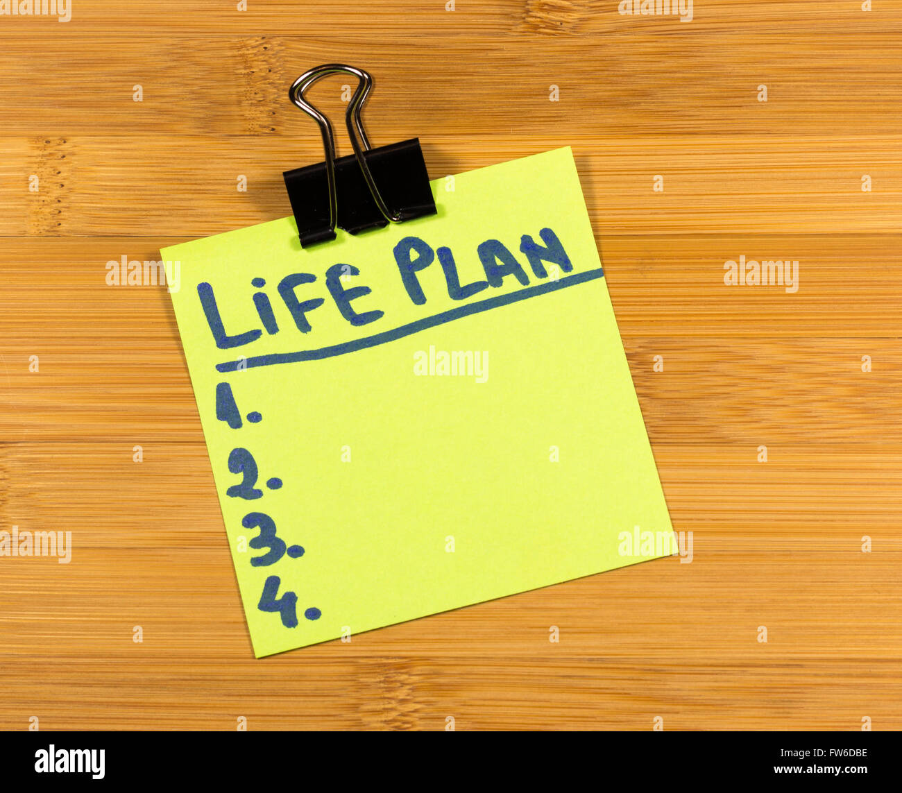 life plan sticky note on wooden background Stock Photo