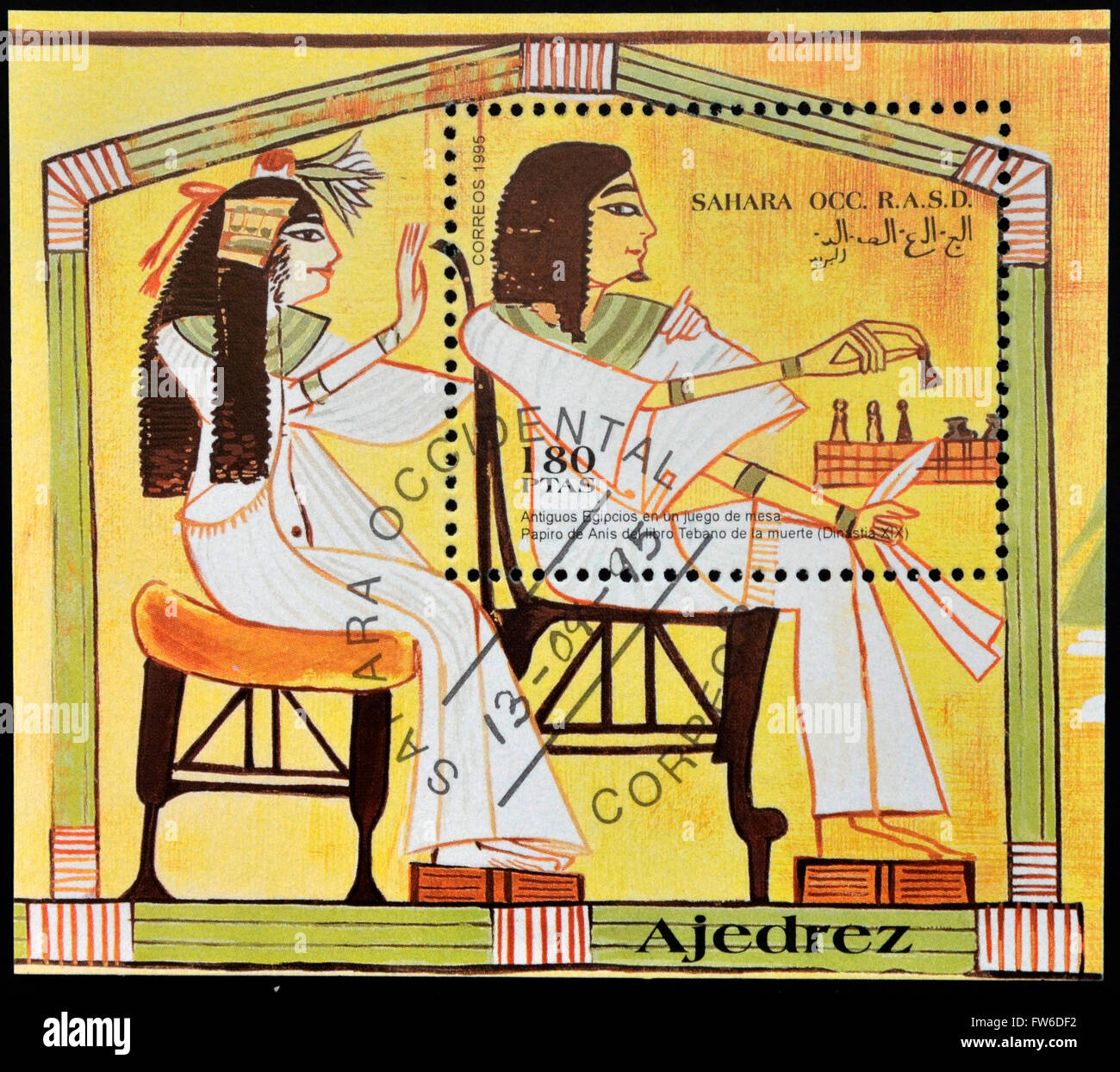 SAHARA OCC RASD - CIRCA 1995: A stamp printed in Sahara OCC. R.A.S.D shows ancient Egyptians playing chess, circa 1995 Stock Photo