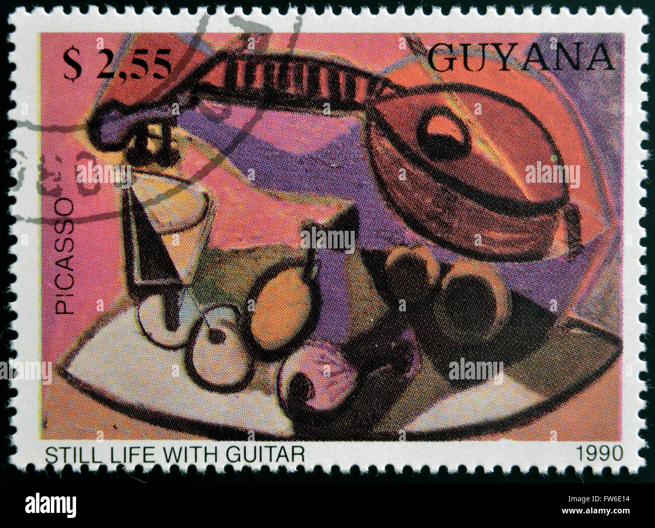 GUYANA - CIRCA 1990: A stamp printed in Guayana shows Still life with guitar by Pablo Picasso, circa 1990 Stock Photo