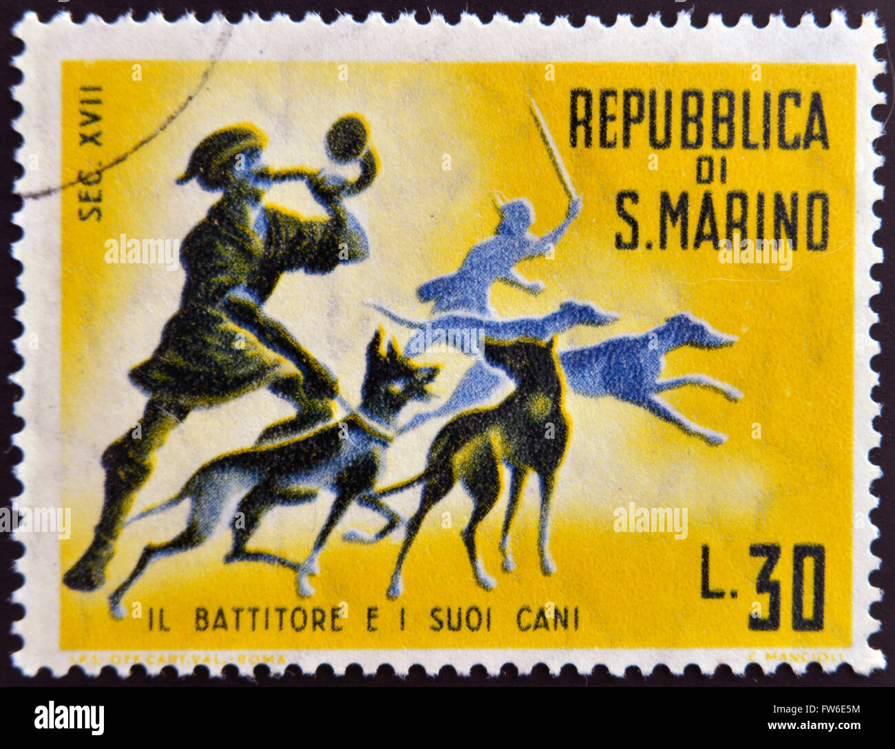 SAN MARINO - CIRCA 1961: A stamp printed in San Marino dedicated to hunting, shows the batter and his dogs, circa 1961 Stock Photo