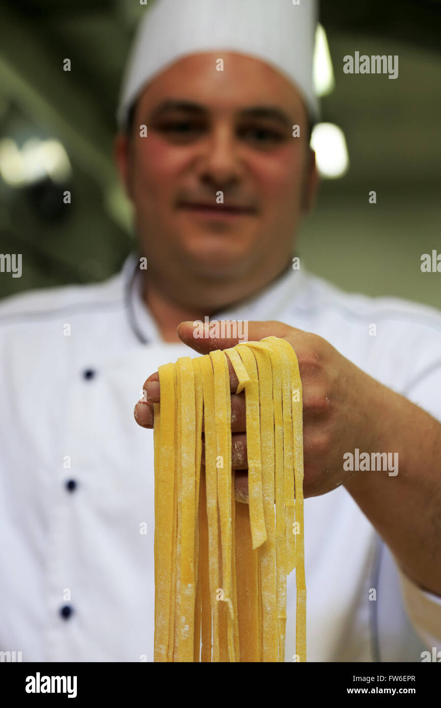 A chef holding handmade pasta, Gubbio, Umbria,Italy Stock Photo Alamy