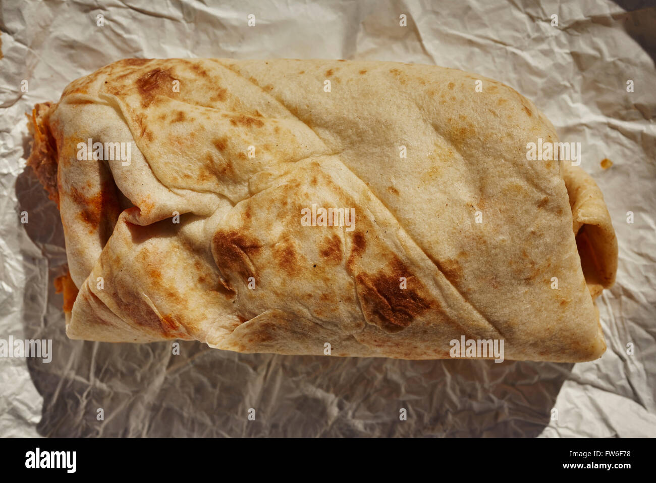 chicharrón filled burrito in the New Mexico style served at Abiquiu, NM, USA Stock Photo
