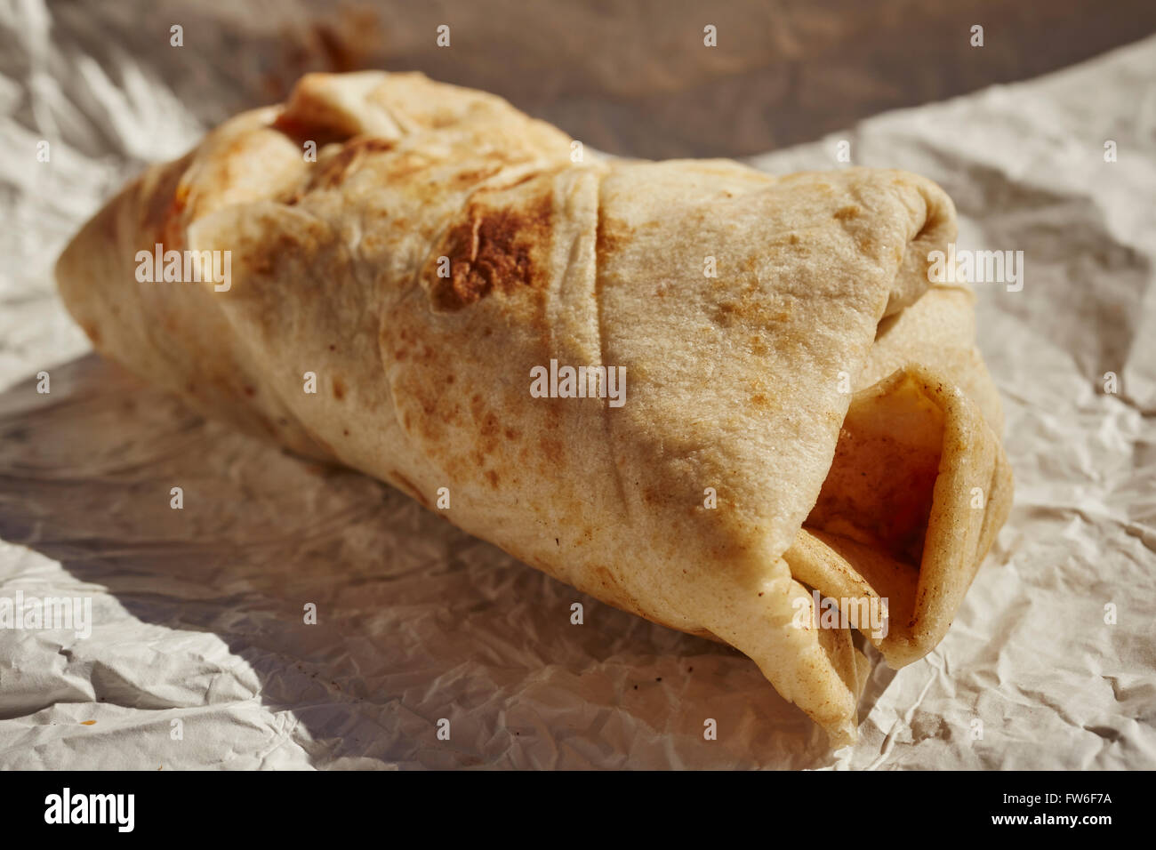 chicharrón filled burrito in the New Mexico style served at Abiquiu, NM, USA Stock Photo
