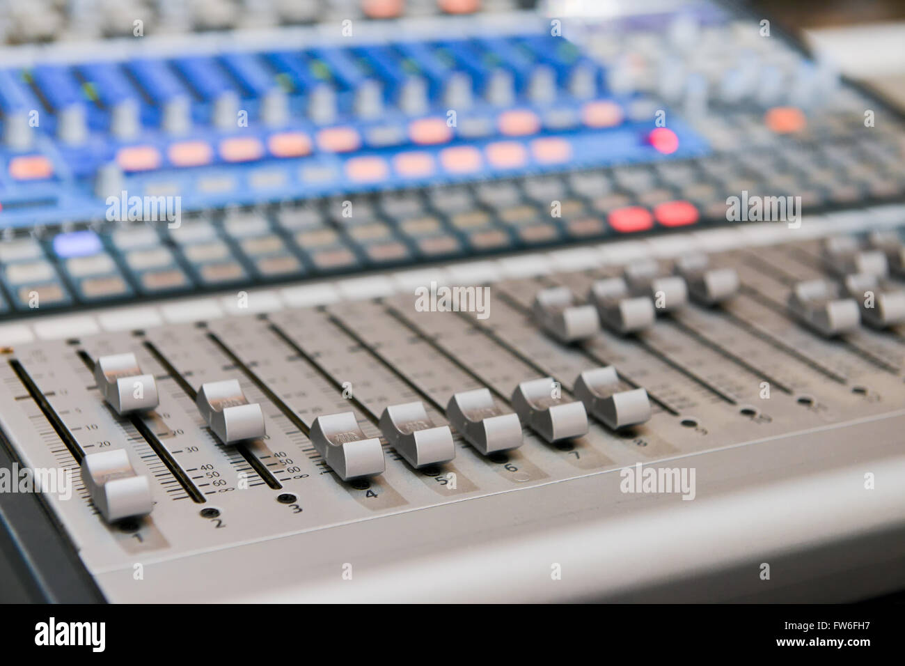 Sound mixer with many buttons with side light Stock Photo Alamy