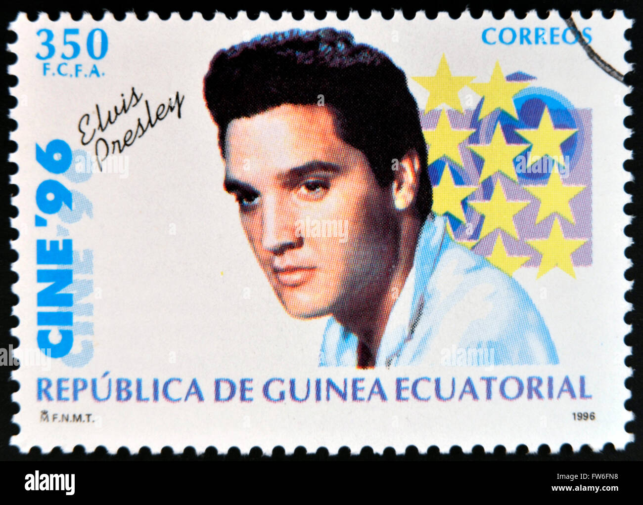 EQUATORIAL GUINEA - CIRCA 1996: A Stamp printed in Guinea dedicated to cinema shows Elvis Presley, circa 1996 Stock Photo