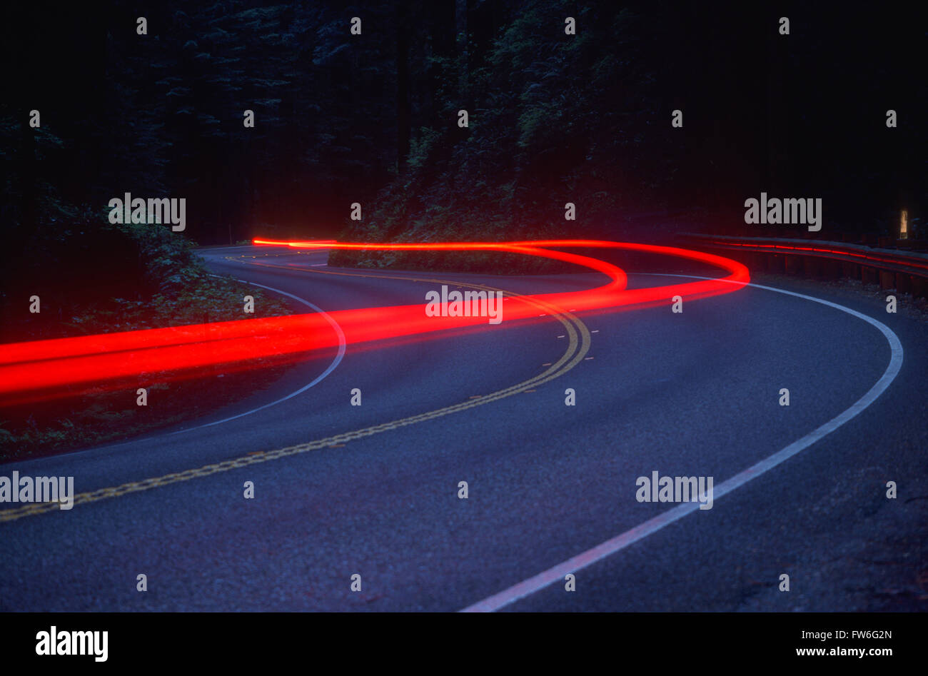 Streaking Car Tail Lights on a Road, California, U.S.A. Stock Photo