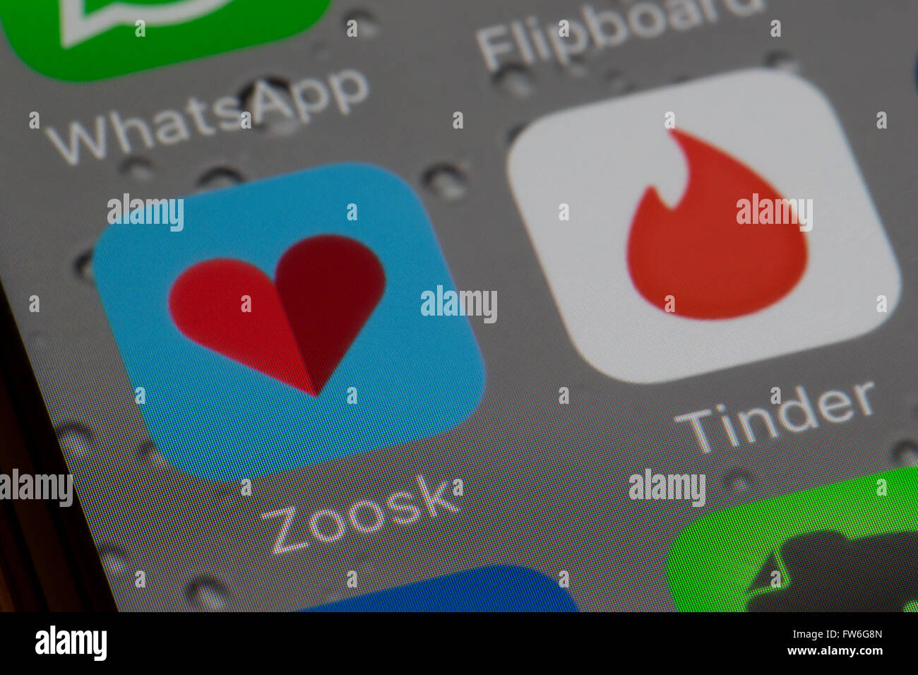 Tinder and Zoosk internet dating apps. Stock Photo