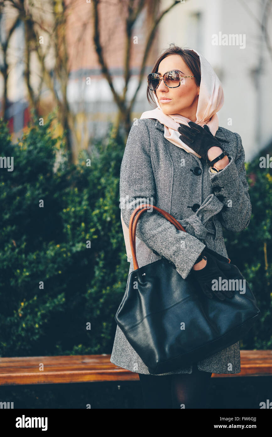 Happy young beautiful girl posing in the park Stock Photo - Alamy