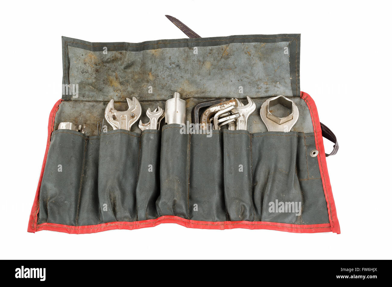Old tool roll carried on an antique Airhead R75 motorcycle for many miles. From back in the days when you could make repairs. Stock Photo