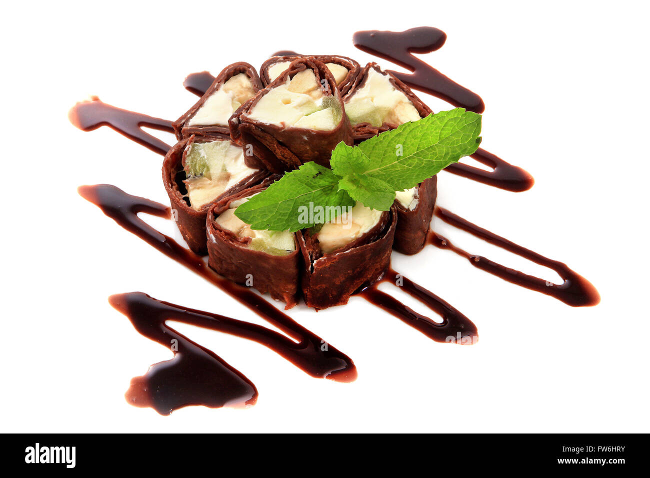 Chocolate Sushi Roll garnished with fruit Stock Photo