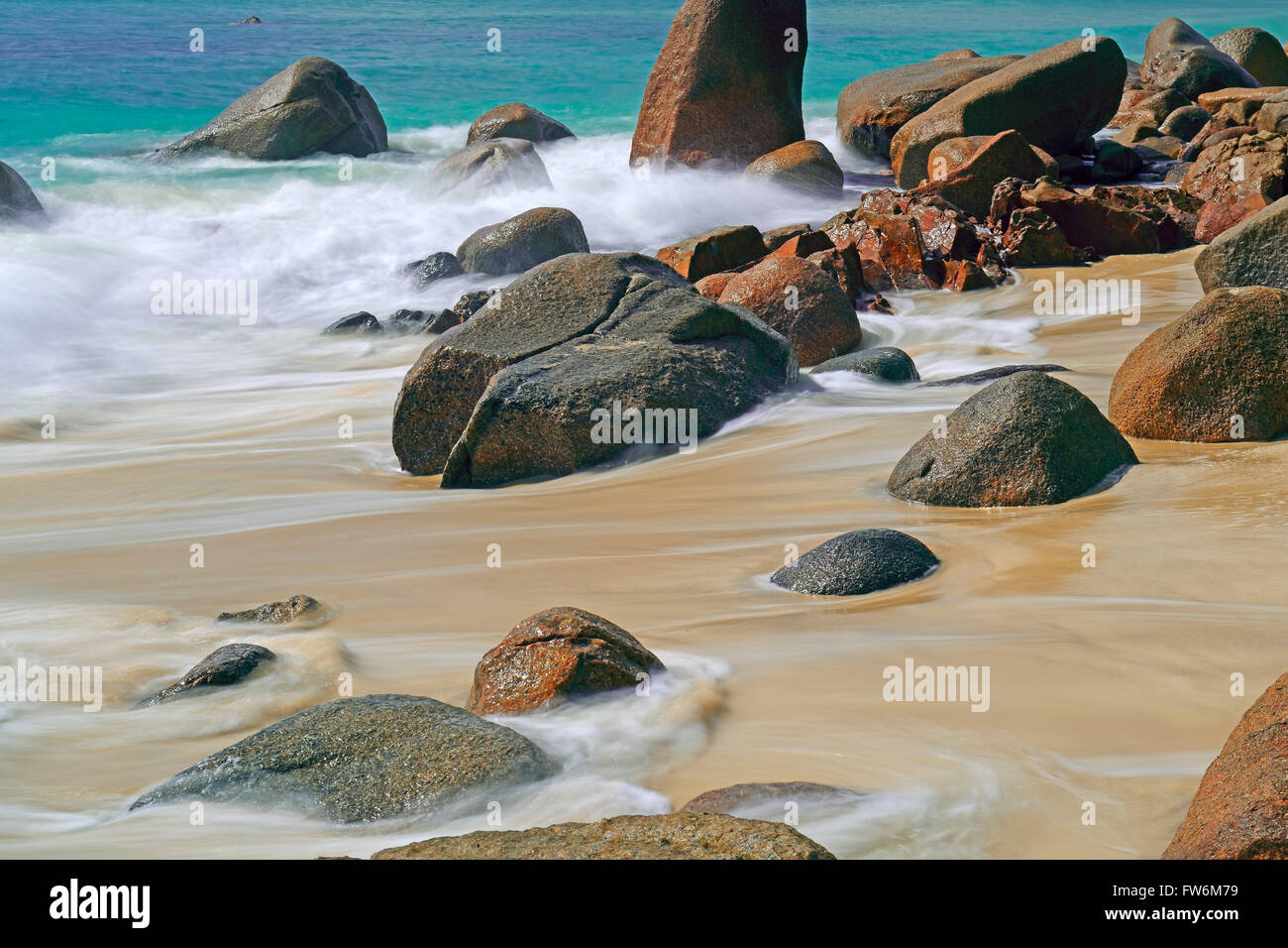 Strand und Granitfelsen am Anse Possession, Langzeitbelichtung , Insel Praslin, Seychellen Stock Photo