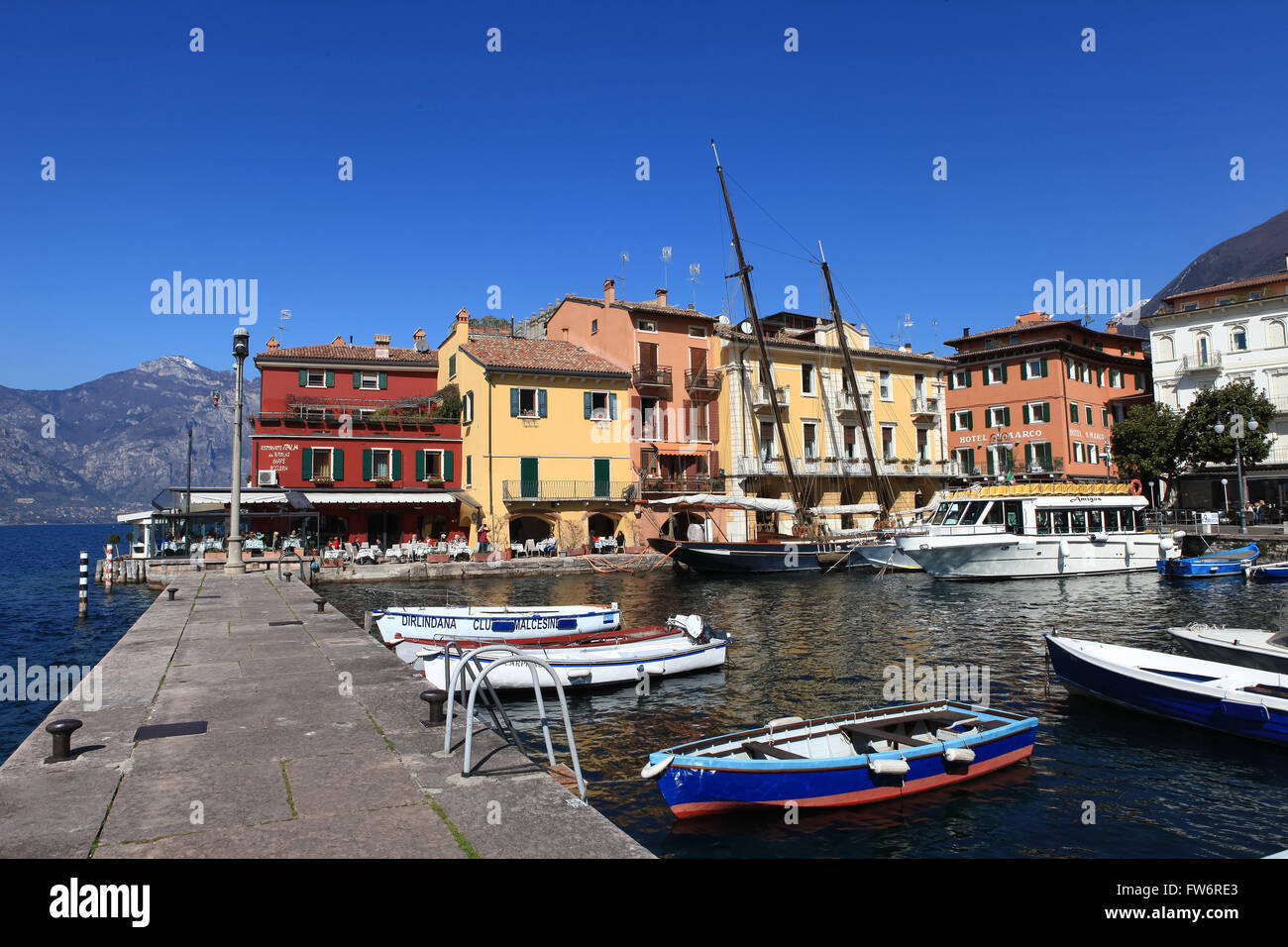 View of Malcesine town center and small port. Malcesine is located on the eastern shore of Lake Garda in the Province of Verona Stock Photo