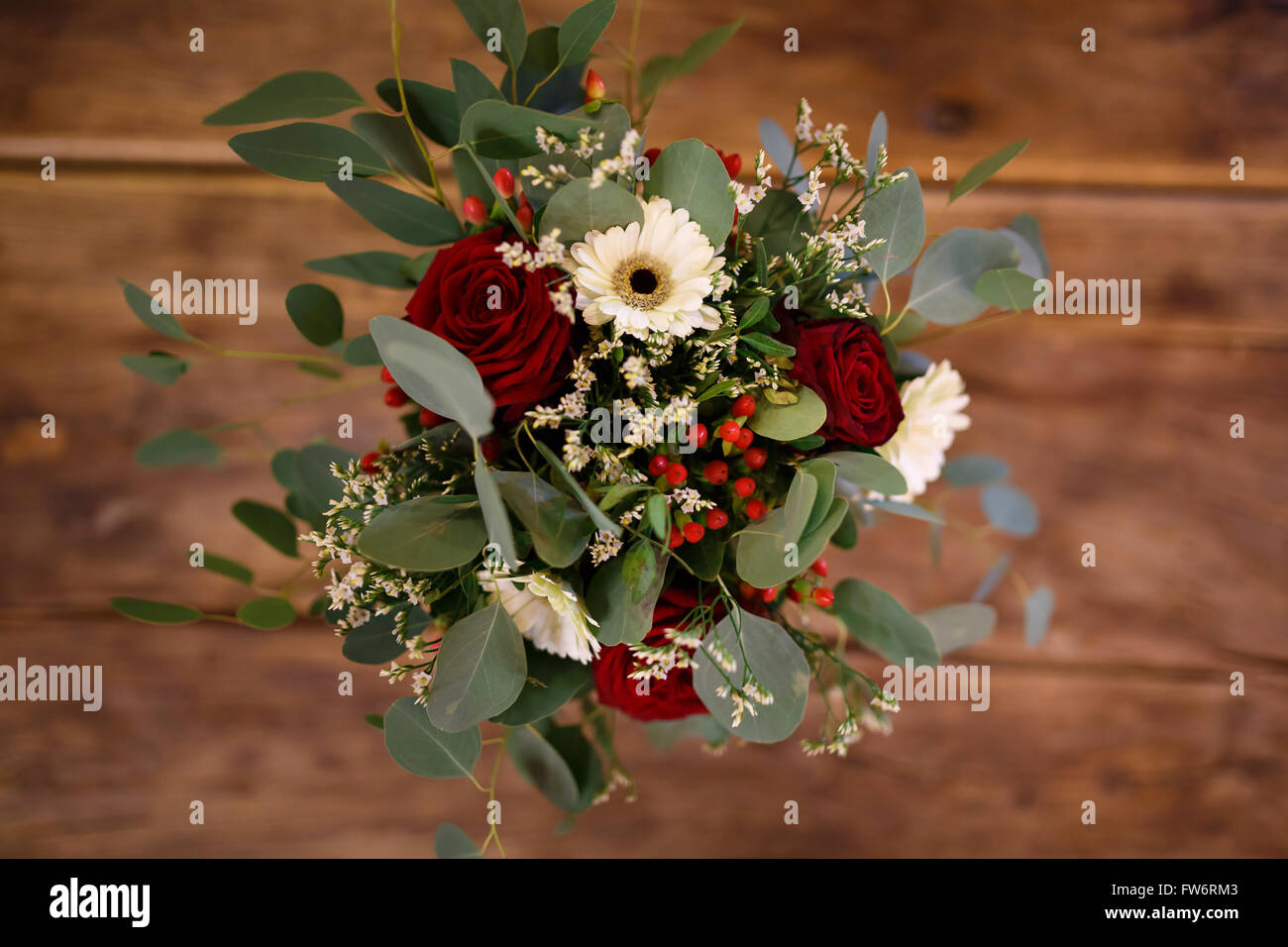 The bridal bouquet on the wooden background Stock Photo