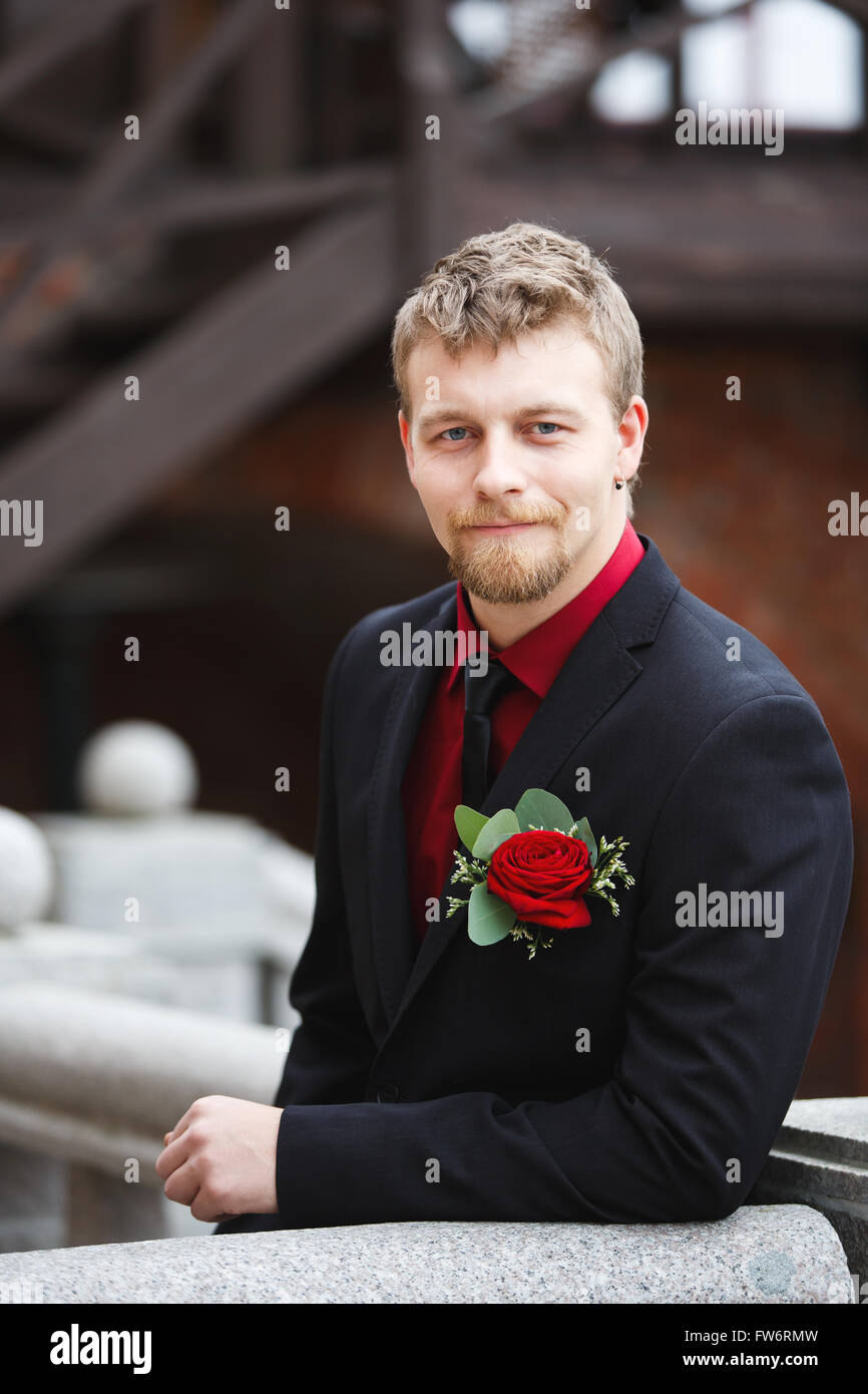 Portrait of the attractive young groom outdoor Stock Photo - Alamy